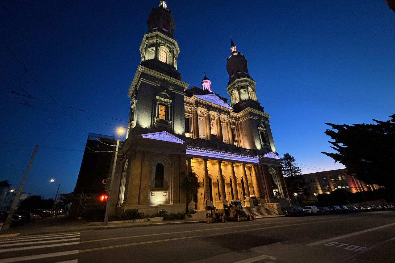 Saint Ignatius Church, San Francisco, lit up before dawn on 30 April 2024